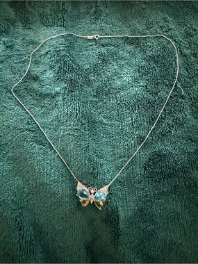 Sterling silver butterfly pendant with topaz and peridot gemstones